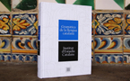 The new  Gramàtica de la llengua catalana on the floor in front of a wall.